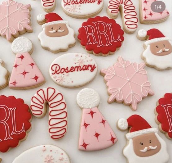 decorated cookies are displayed on a white surface