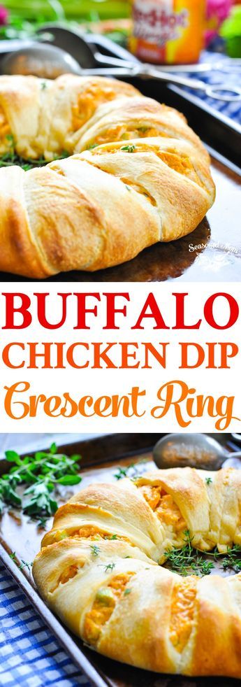 buffalo chicken dip crescent ring on a baking sheet with carrots and parsley in the background