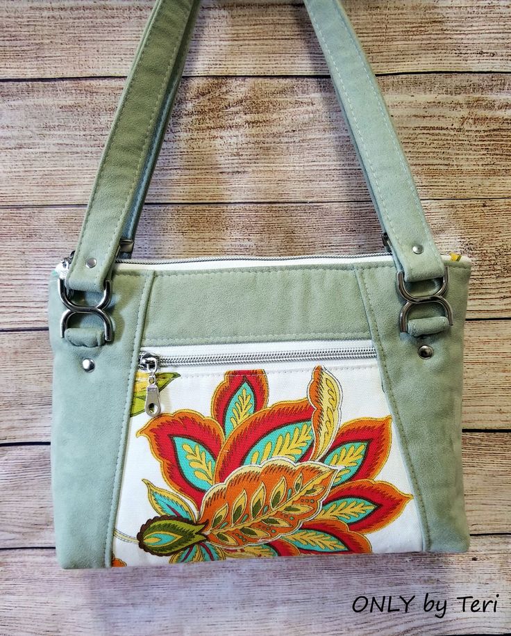 this purse is made with an applique flower design