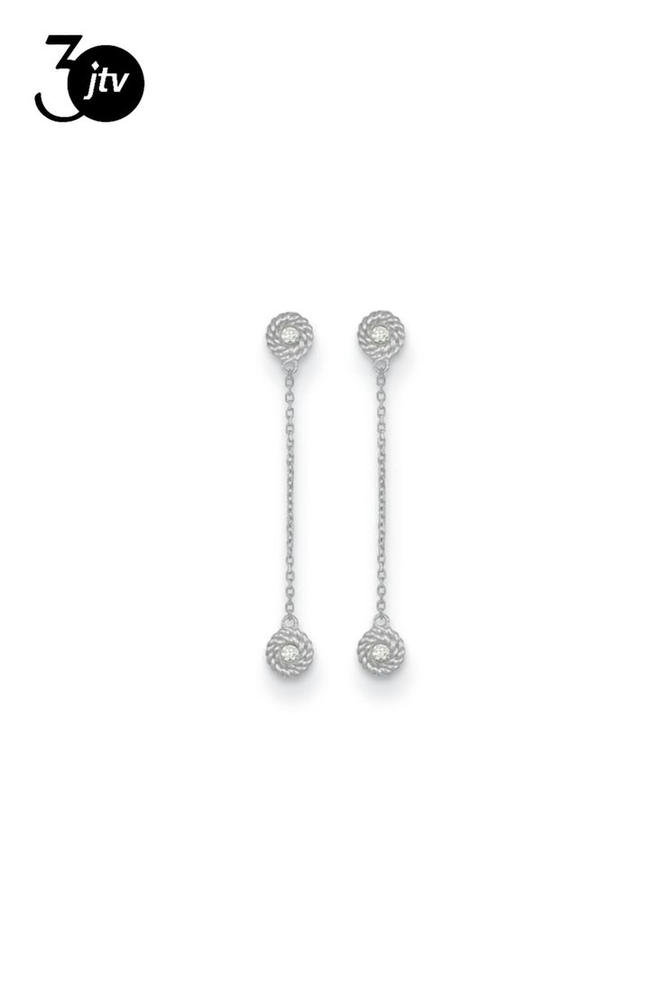 Rhodium over 14K white gold polished circles dangle stud earrings with 0.12 cttw natural round diamonds. Measures approximately 1 11/16"L x 1/4"W and have post and push back closures. White Gold Linear Dangle Earrings With Brilliant Cut, White Gold Diamond Dangle Linear Earrings, White Gold Diamond Dangle Earrings, White Gold Linear Drop Earrings With Brilliant Cut, White Gold Cubic Zirconia Linear Dangle Earrings, White Gold Cubic Zirconia Drop Earrings, Timeless White Gold Cubic Zirconia Linear Earrings, White Gold Drop Earrings With Pave Setting, White Gold Pave Set Drop Earrings