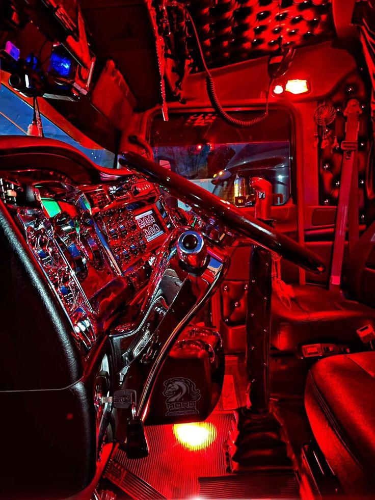 the inside of a vehicle with red lights