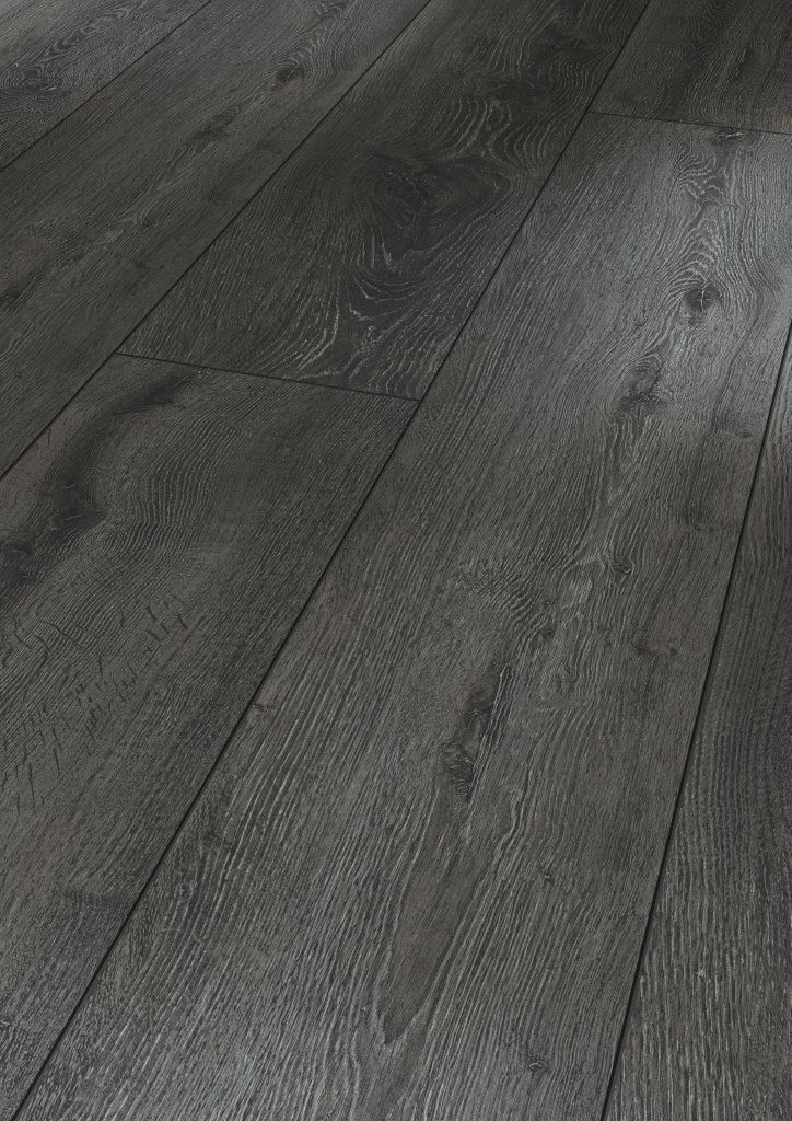 an image of a wood floor that looks like it has been painted in dark grey