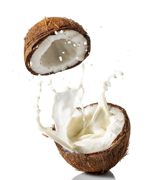 the coconut is being dropped into the milk