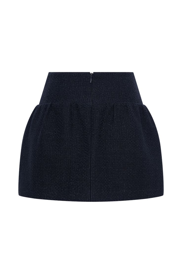 Refined chicThe CYRUS Gathered Boucle Mini Skirt is a stylish and elegant piece perfect for any occasion. This high-waisted mini skirt features a fitted waist yoke panel that accentuates your figure, while the gathered skirt adds a touch of playful sophistication. Crafted from luxurious boucle fabric and fully lined for comfort, it includes a side zip with a hook & eye closure for a seamless fit. Pair it with the Cyrus Strapless Boucle Top for a coordinated and chic ensemble. Chic Luxury Gathered Mini Skirt, Chic Short-length Gathered Mini Skirt, Luxury Chic Mini Skirt With Buttons, Black Textured Mini Skirt, Black Flared Mini Skirt With Gathered Details, Boucle Fabric, A Hook, Gathered Skirt, Hook Eye