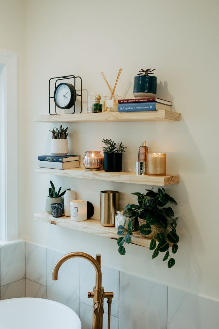 open shelf design, open shelves in bathroom, open shelves above soaking tub, primary bathroom inspiration Shelving Ideas Bathroom, Bathroom Shelf Decor Ideas, Bathroom Shelving Ideas, Bookshelf Decor Ideas, Boho Chic Bathroom, Shelf Decor Ideas, Shelves Above Toilet, Painted Bookshelves, Bathroom Shelf Decor