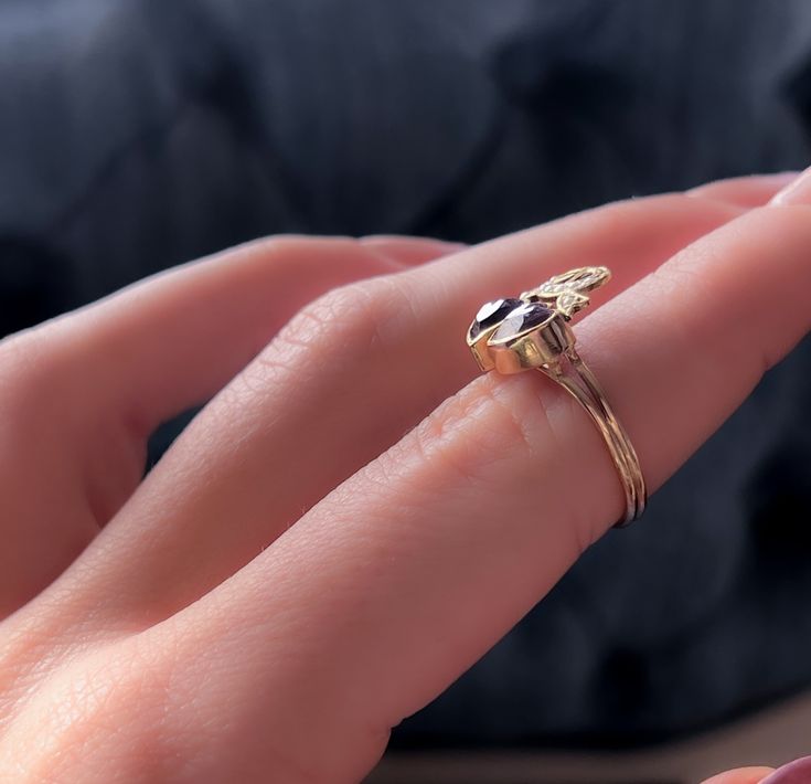 A delectable little Victorian amethyst double heart ring with a pearled ribbon crown! In excellent shape, she may have been converted into a ring by a previous owner with an extremely delicate shank, beautiful split shoulders, and those all original Victorian amethyst hearts. Double hearts are often thought to symbolize two hearts beating as one ♥️💗. Here we see them tied together with a lovers heart, or “pretzel bow,” thought for centuries to denote a love of not only one another, but a shared Elegant 14k Gold Heart Ring For Proposal, Elegant Oval Heart Ring With Birthstone, Elegant Formal Heart Ring With Birthstone, Elegant Amethyst Heart Cut Ring For Wedding, Elegant Oval Heart Ring, Elegant Marquise Cut Amethyst Ring, Elegant Marquise Amethyst Ring As A Gift, Elegant 14k Stamped Amethyst Ring Gift, Elegant Marquise Cut Amethyst Ring For Gift