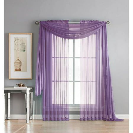 purple sheer curtains hanging in front of a window