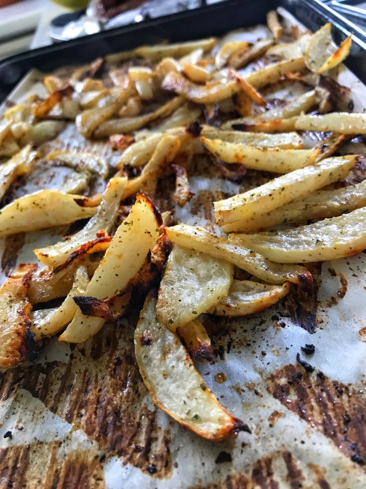 some food is laying out on a pan and ready to be cooked in the oven