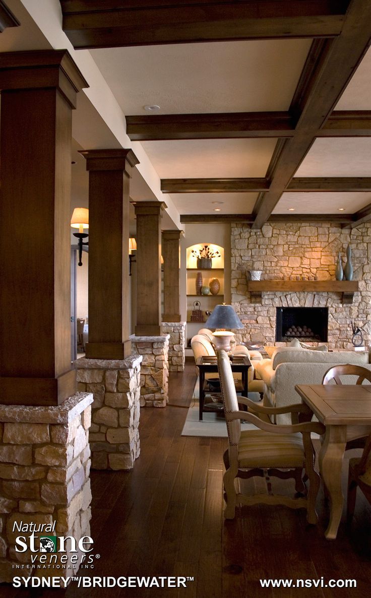 a living room filled with furniture and a fire place