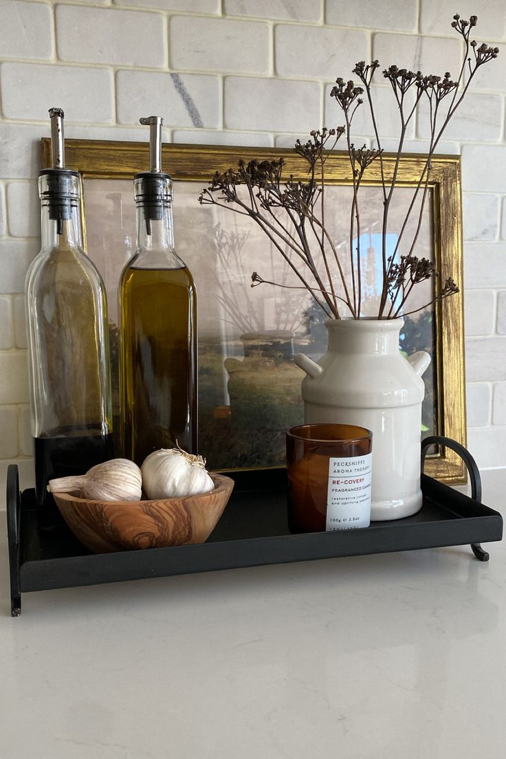 an assortment of spices and bottles on a shelf