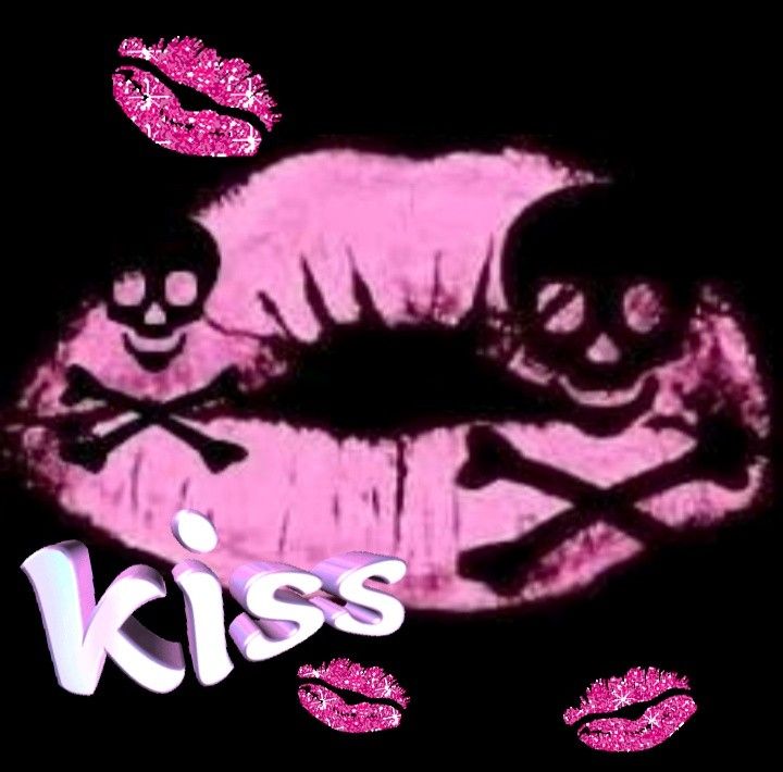 pink lips with skull and crossbones on them are in the shape of a kiss