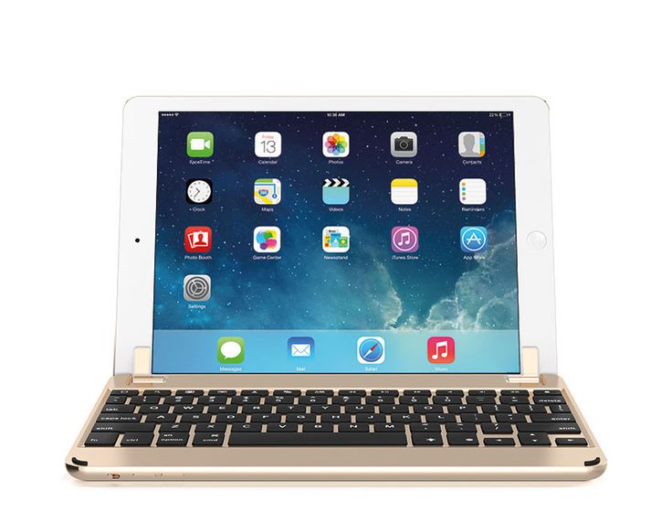 an apple ipad with its keyboard open on a white surface, showing the home button and icons