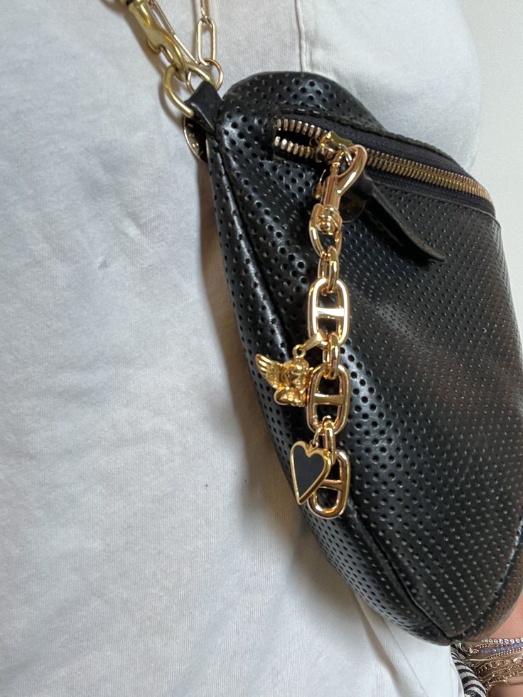 Upgrade your bag game with the Bianca Bag charm. This beautiful chain link charm will elevate any bag, adding a touch of elegance and style. Accessorize like a pro and make a statement with the Bianca Bag charm. Luxury Bag Charm With Keychain, Luxury Metal Bags With Chain Strap, Luxury Metal Bag With Chain Strap, Luxury Metal Bags As Gifts, Luxury Metal Bag As Gift, Elegant Everyday Bag Charm With Logo, Luxury Chain Bags As Gift, Luxury Chain Bag As Gift, Luxury Bags With Logo Charm For Gift