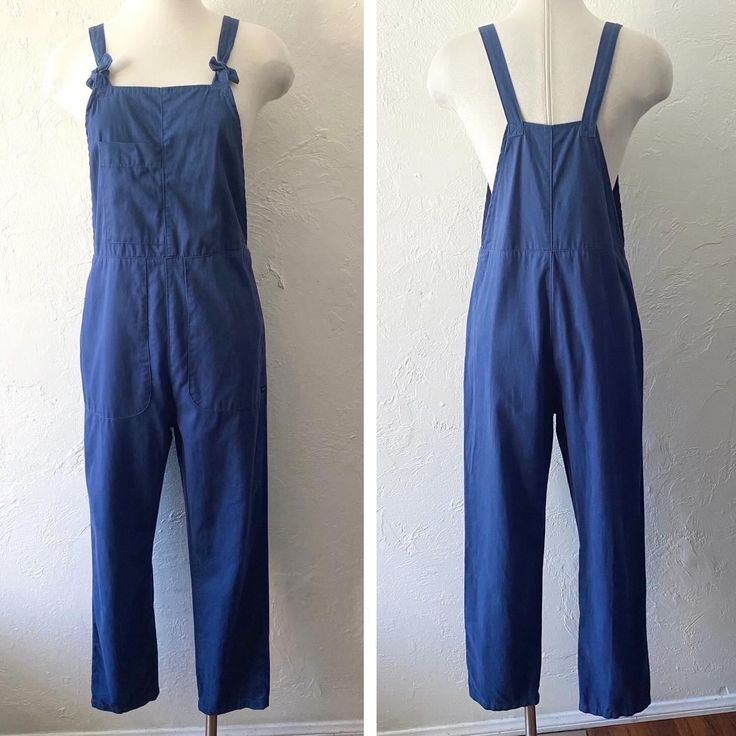 RVCA combed cotton overalls with nice big pockets and adjustable tie straps. Super soft.  Tagged XS, would fit a small also. Across waist 33" hip 39" inseam 26.5" Shown here on a small mannequin with bust 34" waist 24" hip 34" Spring Blue Overalls With Adjustable Straps, Blue Overalls With Adjustable Straps For Spring, Casual Cotton Overalls With Tie Straps, Utility Jumpsuit With Bib Front And Pockets, Utility Jumpsuits And Rompers With Bib Front And Pockets, Solid Cotton Overalls With Bib Front, Cotton Overalls With Bib Front, Cotton Bib Front Overalls In Solid Color, Solid Cotton Bib Front Overalls