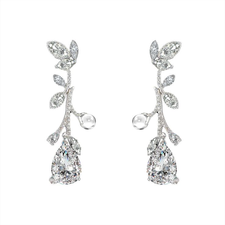 Diamond Citrus Vine Earrings | Over The Moon Luxury Diamond White Earrings With Gemstones, Luxury Formal Earrings With Stone Setting, Luxury White Diamond Crystal Earrings, Luxury White Gold Gemstone Cluster Earrings, Luxury White Topaz Earrings For Wedding, Luxury Brilliant Cut Linear Earrings For Evening, Luxury Silver Linear Earrings With Diamond Accents, Movie Jewelry, Jewelry 2024