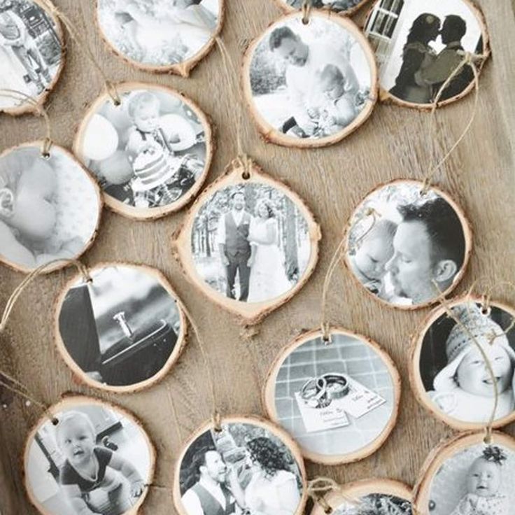 a group of wooden ornaments with pictures on them