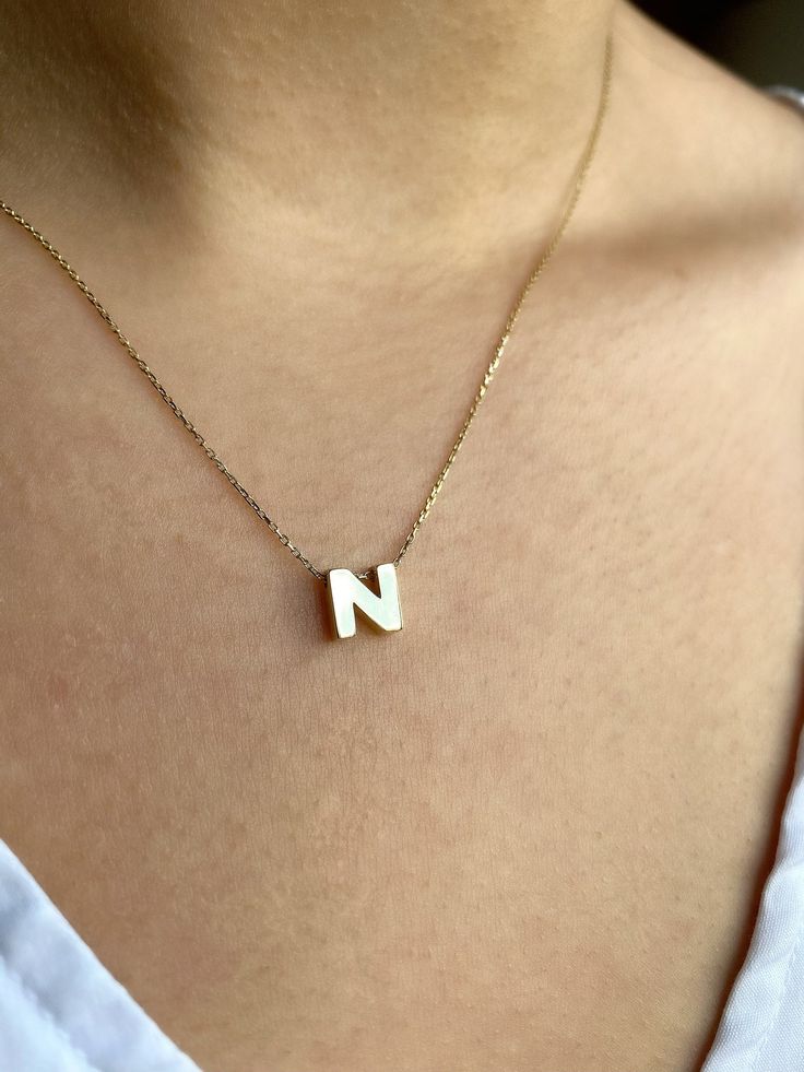 This necklace is made of solid 14K Solid Yellow Gold. We can provide any letter you want. Also it can be produced in 14K Solid White Gold or in 14K Solid Rose Gold as your request. Please contact with us via Etsy Message for different color. Letter pendant dimensions are Height: 6mm, Width: 6mm. Choose the letter you want from the letter options section. Weight of M Letter is 1,53 gr. Weight may change on different letters. It will be sent with signed certificate of authenticity. Necklace Length White 14k Gold Name Necklace For Gift, White 14k Gold Name Necklace As Gift, 14k Gold Engraved White Necklace, 14k Gold White Name Necklace For Anniversary, White 14k Gold Name Necklace For Anniversary, White 14k Gold Engraved Necklace, Anniversary 14k Gold White Name Necklace, 14k Gold Name Necklace In White As A Gift, 14k Gold Jewelry With Initials In White