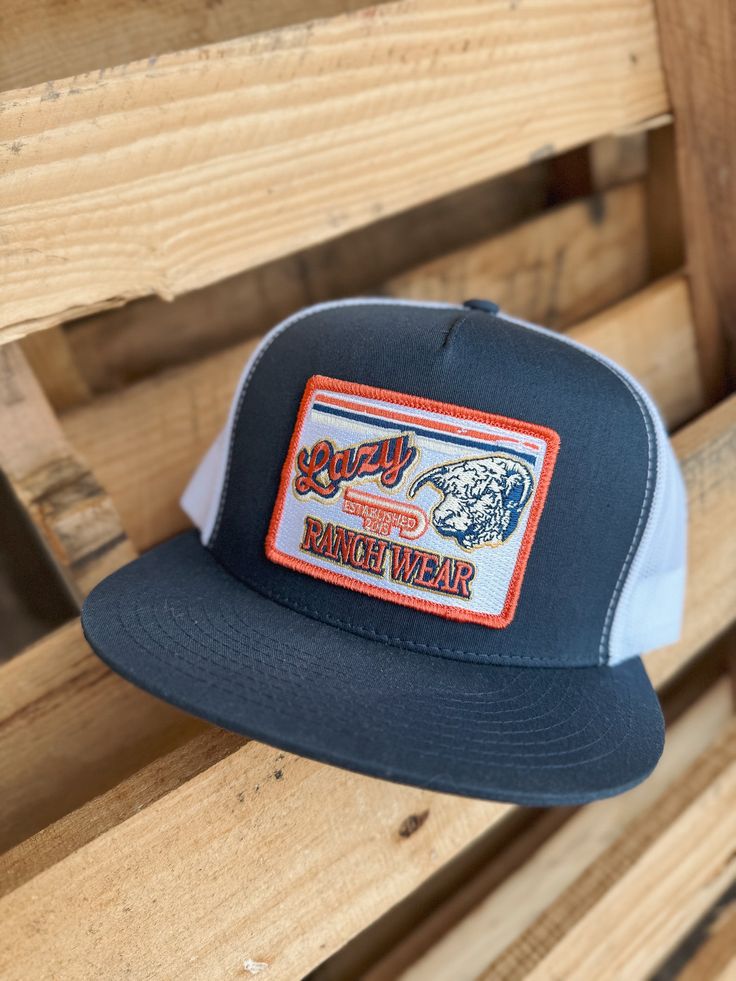 Lazy J Ranch Wear Retro Patch Cap. Navy front, white mesh back. 4 inch crown. Adjustable Snapback. Trucker Mesh Hats For Baseball Season, Trucker Snapback Hat In Mesh For Sports Events, Trucker Mesh Snapback Hat For Sports Events, Mesh Back Trucker Hat With Flat Bill, Mesh Trucker Snapback Hat For Sports Events, White Mesh Baseball Hats For Baseball Season, White Mesh Hat For Baseball Season, White Mesh Trucker Hat One Size, One Size Trucker Hat With Visor For Sports Events