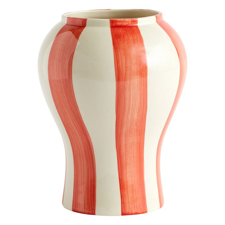 an orange and white striped vase is shown on a white background with red stripes in the bottom