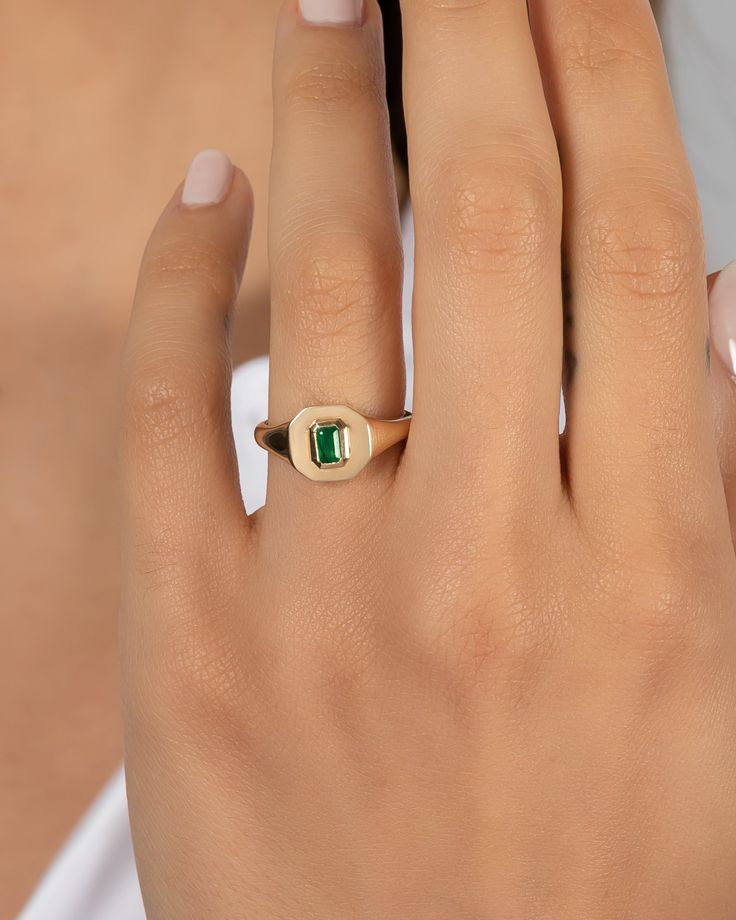 Timeless and chic large signet ring with a centered emerald cut Emerald stone. A modern touch of a classic signet ring with the perfect amount of sparkle. Made in L.A. Ships in 6-8 business days Note: for rush orders it ships in 3-6 business days Comes gift ready in a beautiful, custom Zoe Lev jewelry box. Classic Green Open Signet Ring, Elegant Rectangular Emerald Signet Ring, Modern Emerald Cut Emerald Signet Ring, Fine Jewelry Emerald Cut Signet Ring With May Birthstone, Fine Jewelry Emerald Cut Signet Ring For May Birthstone, Timeless Yellow Gold Signet Ring With Emerald, Timeless Yellow Gold Emerald Signet Ring, Timeless Emerald Cut Signet Ring Gift, Emerald Cut Emerald Signet Ring