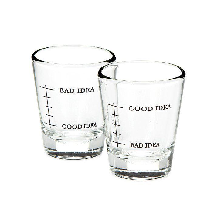 two shot glasses with the words bad idea and good idea written in black on them