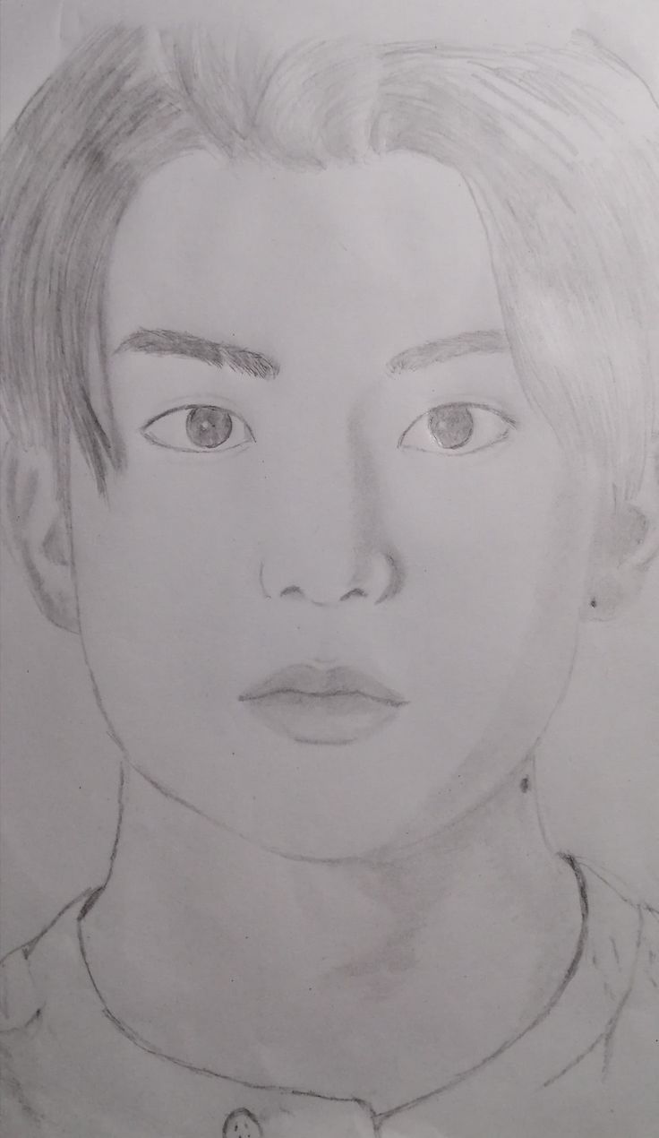 a pencil drawing of a young man's face