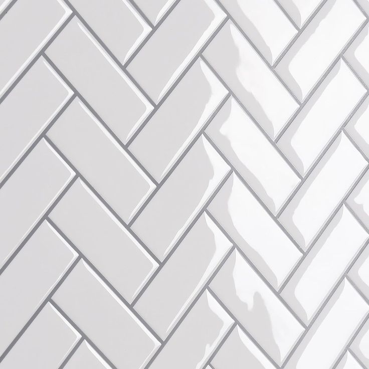 a white brick wall that looks like it is made out of tile