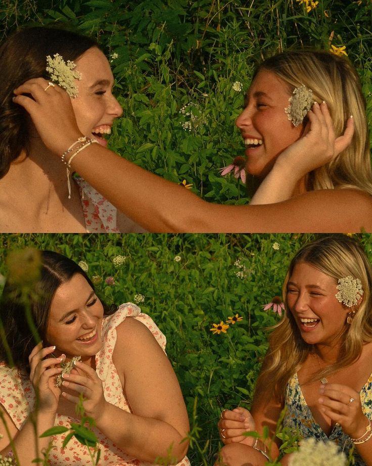 two young women laughing and having fun in the grass with flowers on their heads,