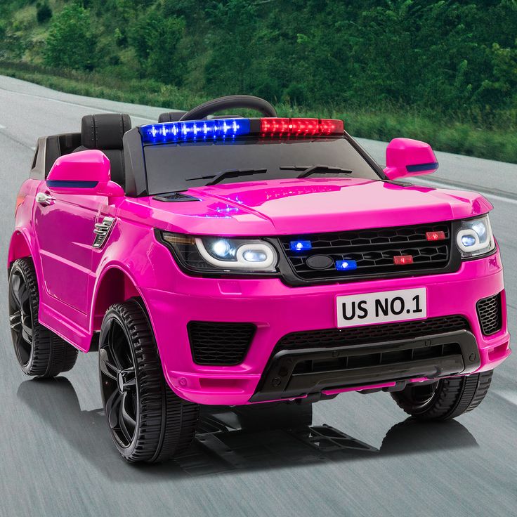 a pink children's ride on toy truck with lights