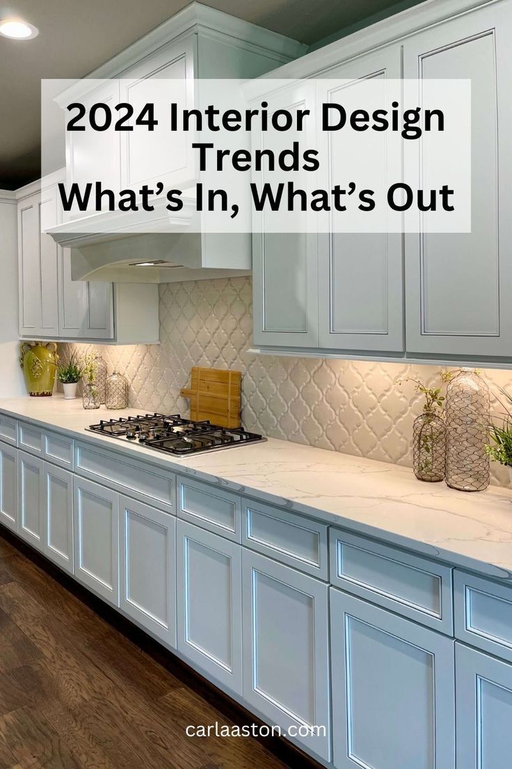 a kitchen with white cabinets and counter tops that says, 202 interior design trend what's in, what's out