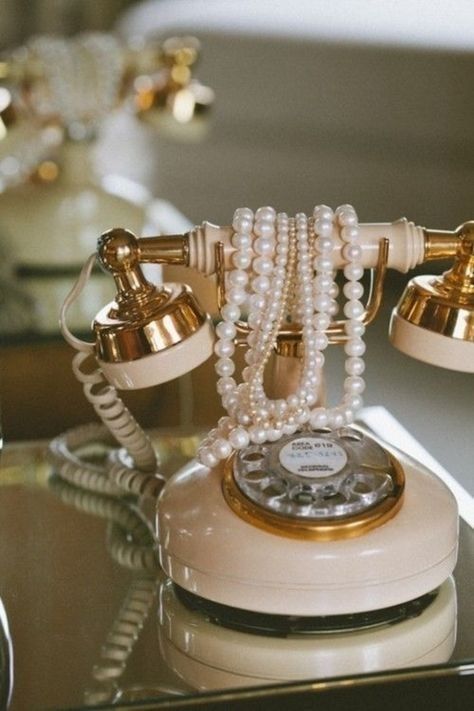 an old fashioned phone with pearls on it and the words heaven's telephone number