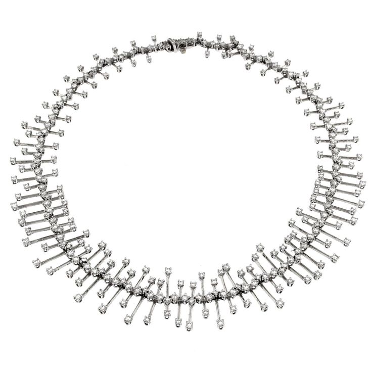 Necklace from the constellation Collection made of white gold and white diamonds This beautiful necklace was made with 171 diamonds from 0.02, 20 diamonds from 0.04 and 94 by 0.05 for a total caratage of 8.88 The total weight of the necklace is GR 36.40 Stamp 750 10 MI Diamond White Platinum Diamond Necklace For Evening, Diamond White Platinum Necklace For Evening, Platinum Diamond White Necklace For Evening, Platinum Necklace With Diamond White Baguette Diamonds, Cubic Zirconia Diamond Necklace In White Gold For Evening, White Gold Cubic Zirconia Diamond Necklace For Evening, Diamond White Platinum Necklace With Baguette Diamonds, Platinum Diamond Necklace With Baguette Diamonds, Platinum Diamond White Necklace With Baguette Diamonds