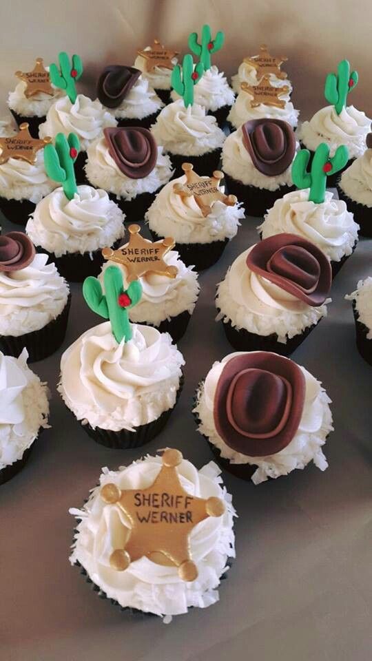 cupcakes decorated with chocolate and white frosting