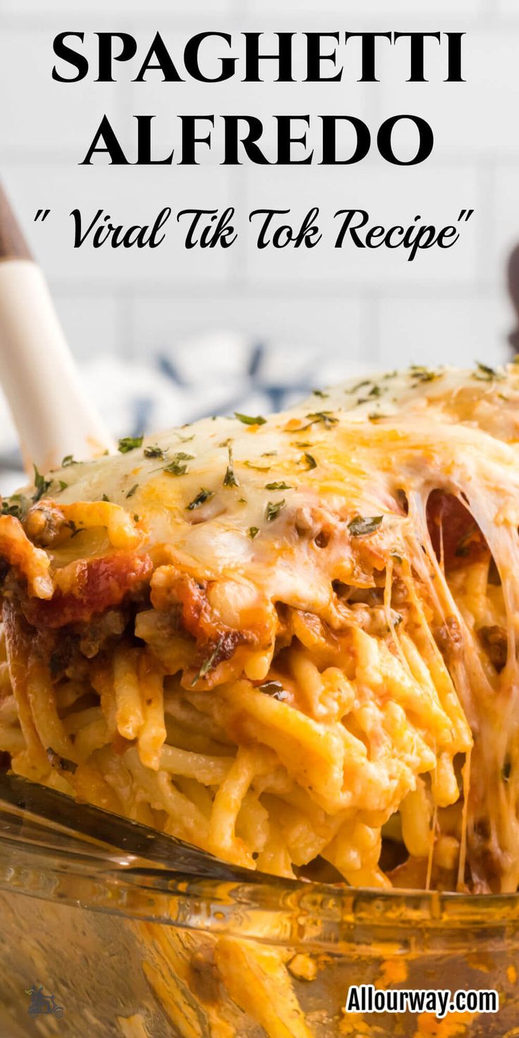 a casserole dish with cheese and meat in it on top of a table