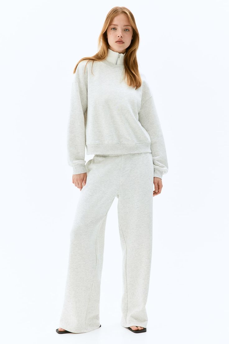 2-piece Sweatsuit - Regular waist - Round Neck - Light gray melange - Ladies | H&M US Fleece Sweats With Elastic Cuffs For Loungewear, Casual Soft Texture Sweatshirt For Lounging, Casual Lounging Sweatshirt With Soft Texture, Casual Sweater With Ribbed Cuffs For Lounging, Casual Sweatshirt For Lounging With Soft Texture, Fleece Sweatpants With Ribbed Cuffs For Lounging, Comfy Sweats With Ribbed Cuffs, H&m Long Sleeve Sweatshirt With Ribbed Cuffs, H&m Winter Sweatshirt With Ribbed Cuffs