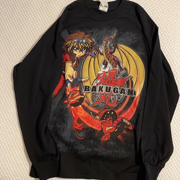 Brand New Bakugan Battle Brawlers Design Long Sleeve Shirt Solid Black Back Kids Size Xl Black T-shirt With Character Print For Winter, Black Long Sleeve Top With Anime Print, Casual Black Sweatshirt For Fan Merchandise, Black Long Sleeve Top With Character Print, Casual Black Sweatshirt For Fans, Black Character Print T-shirt For Winter, Black Anime Print Crew Neck Sweatshirt, Black Cartoon Print T-shirt For Winter, Black Cartoon Print T-shirt