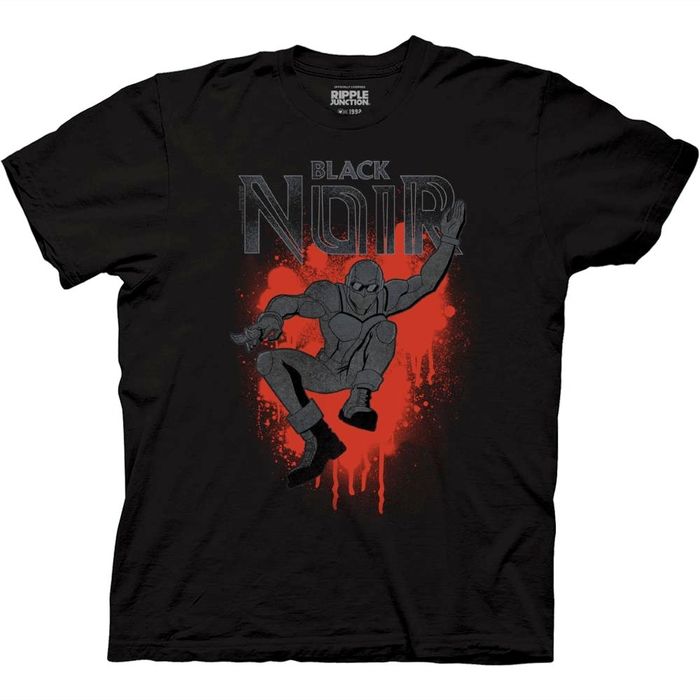 Introducing the "Diabolical Black Noir" t-shirt from The Boys, a wickedly stylish and irresistibly dark addition to your wardrobe that lets you channel your inner anti-hero with an unapologetic edge, direct from our line of Officially Licensed The Boys: Diabolical Merch! Black Crew Neck T-shirt With Front Print, Pre-shrunk Black Graphic Tee, Black Crew Neck Top With Front Print, Black Fan Apparel T-shirt With Character Print, Black Fan Apparel T-shirt With Graphic Design, Black Fan Merchandise Top With Logo Print, Black Short Sleeve Fan Apparel Shirt, Black Tops With Logo Print For Fan Merchandise, Black Logo Print Tops For Fan Merchandise