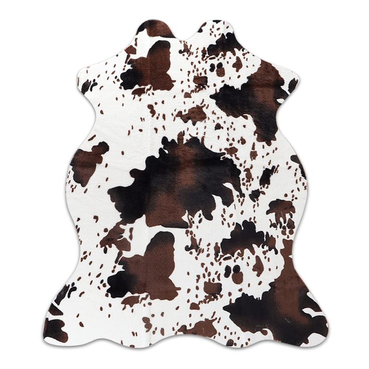 a brown and white cowhide rug with spots on it's back side,