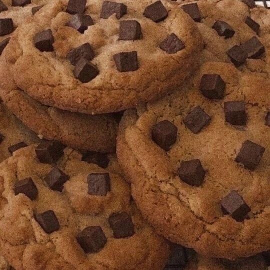 chocolate chip cookies stacked on top of each other