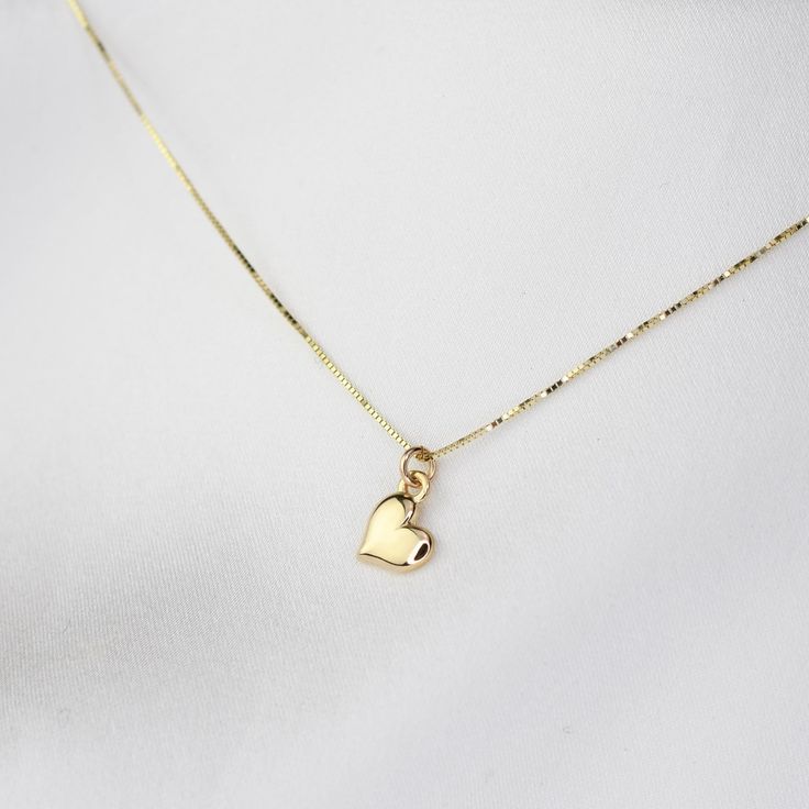 14K Solid Gold Tiny Heart Charm Necklace  ♡ The tiny heart charm is about 6.5mm x 8mm. It is tiny. ♡ 14K gold necklace is 0.5mm box chain ♡ 14K gold components Tiny Heart Pendant Charm Necklace For Everyday, Tiny Heart Pendant Charm Necklaces For Everyday, Gold Heart Pendant Necklace With Box Chain, Everyday 14k Gold Open Heart Charm Necklace, Simple Gold Charm Necklace For Valentine's Day, 14k Gold Charm Necklace For Valentine's Day Gift, Dainty 14k Gold-filled Yellow Gold Heart Necklace, Dainty 14k Gold-filled Heart Necklace In Yellow Gold, Everyday 14k Yellow Gold Filled Heart Necklace