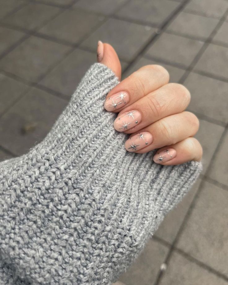 6. Frosty Star Accents for Cozy Winter Vibes Nude Christmas Nails, Silver Nail Designs, Christmas Nail Ideas, Holiday Nails Winter, Glitter French Tips, New Years Eve Nails, Nude Nail Designs, Silver Nail, Cute Christmas Nails