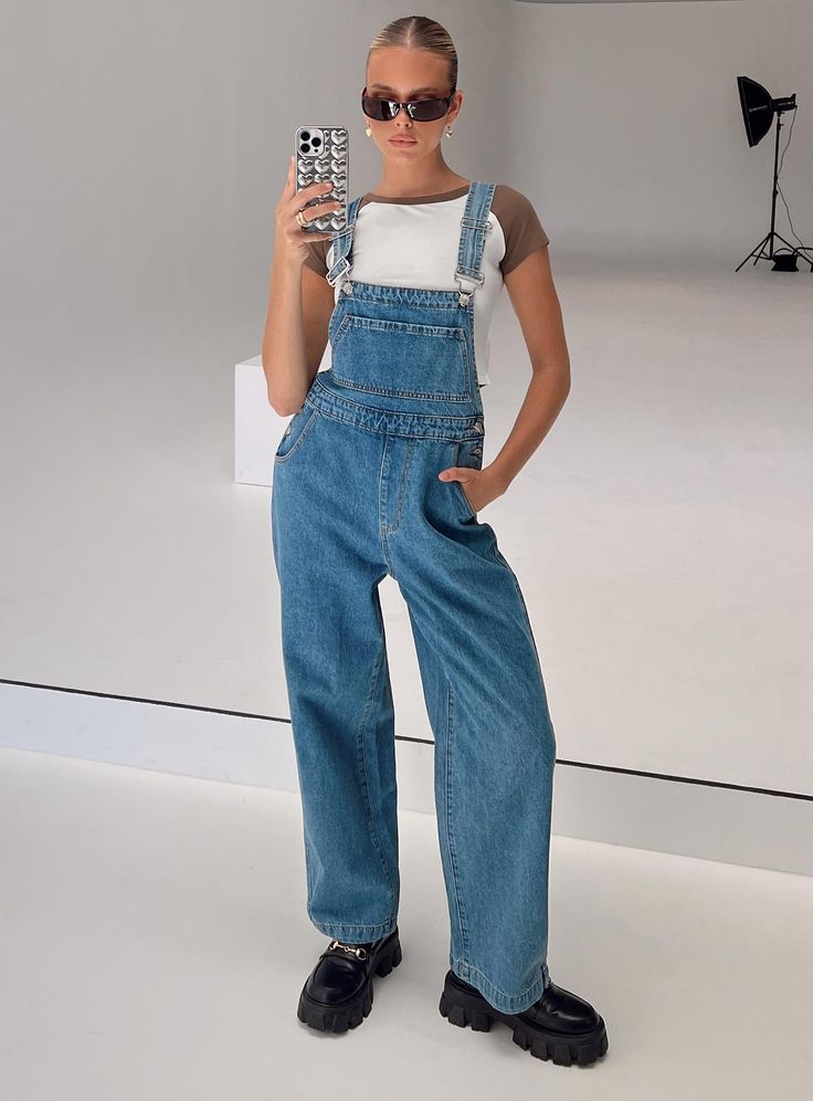 Overalls   100% cotton  Mid wash denim  Adjustable shoulder strap   Large chest pocket   Four classic pockets   Button fastening at hips   Wide leg    Non-stretch  Unlined Campus 00, Long Overalls, 00s Style, Overalls Denim, Aesthetic Baby, Friday Outfit, Pink Formal Dresses, Fleece Dress, Outerwear Outfit