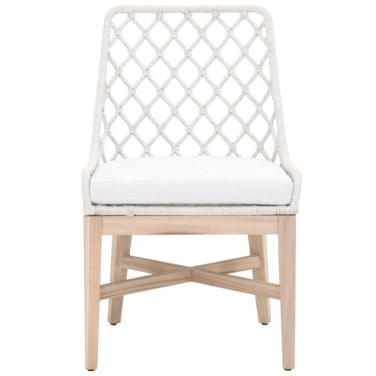 an upholstered chair with white fabric