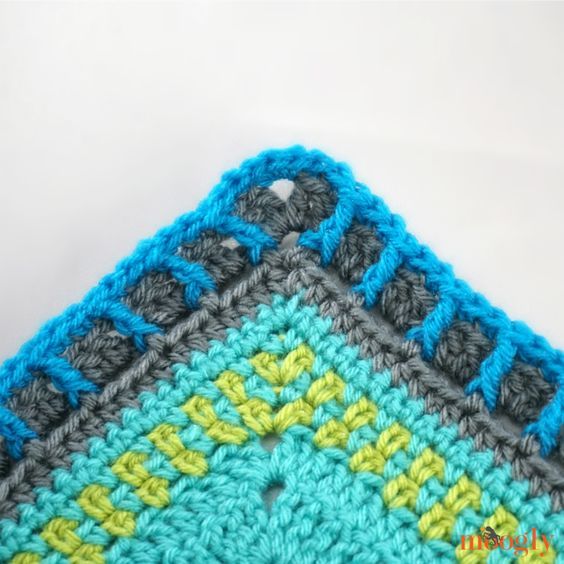 there is a crocheted square that has been made into a granny afghan pattern