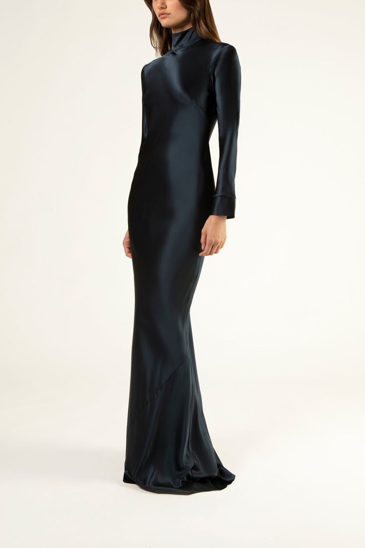 Pure silk charmeuse long sleeve gown cut on the bias. Features a dramatic open back and a high neckline with self buttons. Fully lined in silk. Made in USA. Composition: 100% silk Summer Ball Dresses, Deb Ball, Black Formal Gown, Long Sleeve Backless Dress, Long Sleeve Silk Dress, Party Wear Gowns, Modern Gown, Michelle Mason, Long Gown Dress