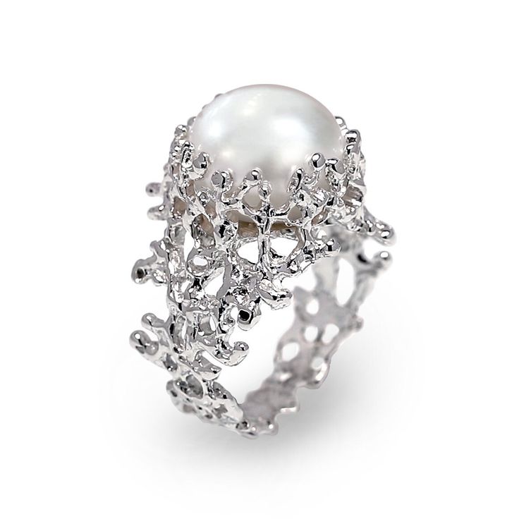 This unique sterling silver coral ring is a part of our signature collection inspired by my fascination for the living sculptures created by corals. The pearl is a large, top quality white freshwater pearl. This organic, natural looking ring, is refined and at the same time spectacular. The pearl is set on a pin, and is firmly held by the coral structure. SEE THE ACTUAL RING IN 360 DEGREE VIDEO ON OUR YOUTUBE CHANNEL - https://youtu.be/Ko_Mle4RA5k All our jewelry, personally designed by Arosha, Gold Pearl Engagement Ring, Coral Structure, Organic Gold Ring, White Gold Pearl Ring, Black Pearl Ring, Unique Gold Rings, White Pearl Ring, Unique Silver Rings, Blue Topaz Engagement Ring