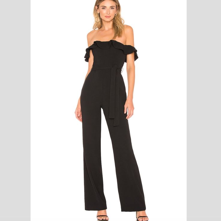 New Without Tags. Get Cocktail Party Ready With The Flirty And Sophisticated Zena Jumpsuit. A Stretch Crepe Fabric Takes An Off-The-Shoulder Neckline With A Ruffle Trim That Adds A Girlish Touch To The Tailored Pantsuit. Self: 95% Poly 5% Elastane Lining: 97% Poly 3% Elastane Hand Wash Cold Non-Slip Silicone Lined Neckline With Ruffle Trim Body Measures Approx 21" In Length 19" At The Knee Breaks To 21" At The Leg Opening. Approximate Measurements For A Size Xs: Pit To Pit 14.5 Inches, Waist 13 Fitted Strapless Jumpsuit For Spring Evening, Chic Fitted Strapless Jumpsuit For Going Out, Elegant Strapless Jumpsuit For Going Out, Fitted Strapless Jumpsuit For Night Out In Spring, Fitted Strapless Jumpsuit For Spring Night Out, Glamorous Strapless Jumpsuit For Summer Formal Events, Elegant Fitted Strapless Jumpsuit For Going Out, Elegant Fitted Strapless Jumpsuit For Spring, Elegant Strapless Jumpsuit For Spring Night Out