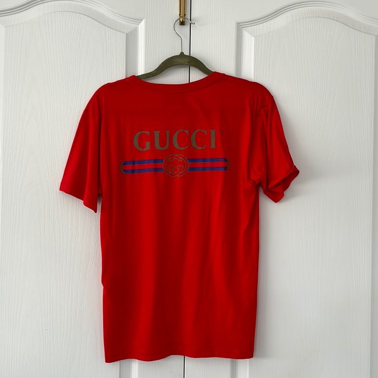 Size Small, Red Men’s Gucci T-Shirt Gucci Short Sleeve T-shirt With Logo Print, Gucci Short Sleeve T-shirt For Streetwear, Gucci Crew Neck Top With Logo Print, Casual Gucci Short Sleeve T-shirt, Gucci Casual Short Sleeve Shirt, Red Gucci Cotton Top, Gucci Casual Short Sleeve Tops, Casual Gucci Short Sleeve Tops, Casual Short Sleeve Gucci Shirt