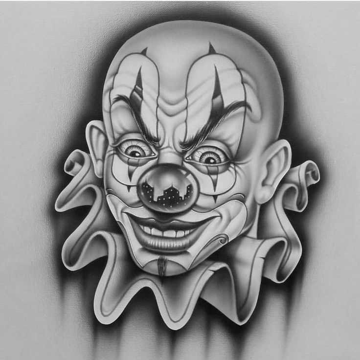 a drawing of a clown's face in black and white