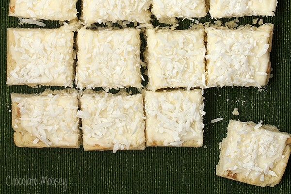 there are many pieces of food that is cut up and ready to be eaten on the table